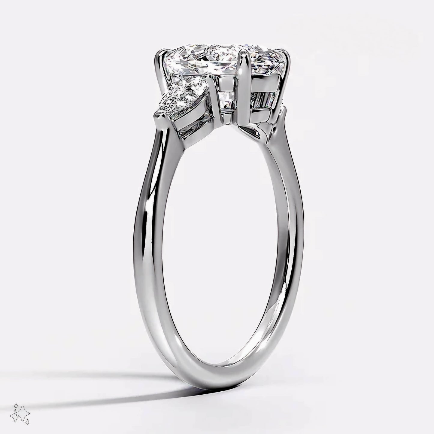 Round and Pear Trilogy Diamond Ring
